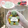 Amigurumi crochet turtle with a sunflower shell held in hands, featuring a card that reads Happy Birthday.!