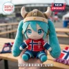Hatsune Miku plush doll wearing a viking helmet and a red Norway soccer jersey with number 9 on a blurred outdoor background.!
