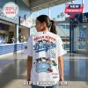 Person wearing white Los Angeles Dodgers baseball jersey with Hello Kitty and friends graphic prints on the back.!