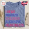 Human Rights Migrant Children Heartbeats T-Shirt in blue with pink and purple text printed on soft cotton fabric.