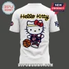Indiana Fever x Hello Kitty white t-shirt featuring a basketball-themed Hello Kitty graphic with a red bow and jersey.