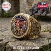 Gold Iron Maiden 50th anniversary championship ring with Eddie figurines, blue enamel accents, and pavé-set crystals.!