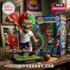 Iron Maiden Eddie vinyl figure wearing England football kit with red and green spiky hair standing on a mini pitch base.!