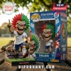 Iron Maiden Eddie figure dressed in England soccer kit with red and green hair on a miniature grass stadium display base.!