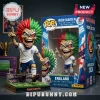 Iron Maiden Eddie vinyl figure wearing England soccer kit with red and green hair, standing on a miniature stadium base.!