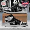 Black and white high-top sneakers featuring Jack Skellington patterns and Nightmare Before Christmas logo text.!