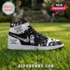 Black and white high-top sneaker featuring Jack Skellington patterns and Nightmare Before Christmas text on grass.!