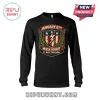 January 6th Never Forget It Was Treason Patriot black long-sleeve t-shirt with American flag shield and lightning bolt.