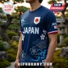 Navy blue athletic t-shirt featuring white sakura blossoms, blue wave patterns, and Japan national emblems.!