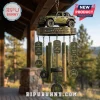 Jeep 85 years commemorative wind chime with miniature olive green SUV, metal tags, tire accents, and Jeep brand text.!