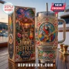 Jimmy Buffett 250 Years of Freedom 40oz Handle Tumbler with parrot, guitar, and floral motifs on a boat deck background.