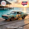 Jimmy Buffett Margaritaville Custom Diecast Vehicles feature a teal and orange muscle car on a wooden dock by the ocean.