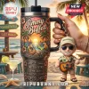 Jimmy Buffett Margaritaville Embossed 40oz Handle Tumbler featuring tropical sunset, guitar, parrot, and coastal icons.