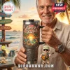 Jimmy Buffett Margaritaville Embossed 40oz Handle Tumbler featuring a tropical beach sunset, guitar, and parrot artwork.