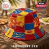 Jimmy Buffett Patchwork Custom Bucket Hat with red, yellow, and blue panels, parrot graphics, and stitched text detail.