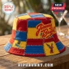 Jimmy Buffett Patchwork Custom Bucket Hat with red, yellow, and blue panels featuring embroidered parrot and palm motifs.
