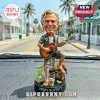 Jimmy Buffett Tropical Musician Resin Bobblehead holding a guitar, sitting on a stool with a blender, parrot, and drink.