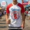 Man wearing a white and red raglan v-neck t-shirt featuring a Nathan's Famous Hot Dog Eating Contest graphic print.!