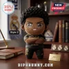 Jude Bellingham Real Madrid plush pillow wearing a black kit with number 5 on shorts, standing on a wooden desk.