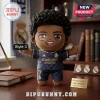 Jude Bellingham Real Madrid plush pillow wearing a navy blue team jersey with number 7 on a wooden desk background.