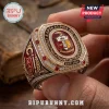 Kappa Alpha Psi fraternity ring featuring red enamel, gold details, a central shield, and embedded crystalline stones.!