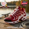 Red and white crocodile-textured sneaker with Bipu Bunny crest, white laces, and gold Greek letters on a wooden dock.!