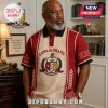 Kappa Alpha Psi Embroidered Crest Polo Shirt featuring crimson and cream vertical panels and fraternity insignia.