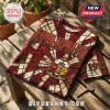Kappa Alpha Psi t-shirt featuring a red and white stained glass pattern, fraternity crest, and 1911 text on a wood bench.!