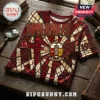 Kappa Alpha Psi t-shirt with red and cream stained glass pattern, fraternity crest, and 1911 text on a wood table.!
