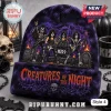 KISS Band Halloween Beanie Hat 2026 featuring a purple knit design with band members, gravestones, and flame graphics.