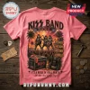 Pink t-shirt with back graphic of KISS band on stage with palm trees, guitars, concert setlist signs, and concert gear.!