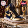 High-top sneaker in metallic gold and navy blue velvet featuring Knights of Columbus emblems on a marble pedestal.!