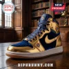 High-top sneaker in metallic gold and navy blue velvet on a wooden table with Knights of Columbus emblem and gum sole.!