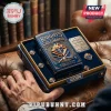 Knights of Columbus Zippo lighter and pins in a blue and gold velvet-lined display box on a leather chair.!