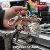 Kyle Busch keychain with metal figurine, tire charm, and shield pendant reading Kyle Busch 1985-2026 Rowdy Nation.!