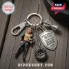 Kyle Busch NASCAR metal keychain with figure, shield plaque reading A Racing Legend Rowdy Nation, and a miniature tire.!