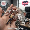 Kyle Busch metal keychain with miniature driver figure, race tire charm, trophy, and shield inscribed with racing stats.!