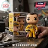 Kyle Busch vinyl collectible figure in yellow racing suit with KB18 box, displayed on a wooden workshop workbench.!