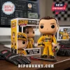 Kyle Busch collectible vinyl figure in yellow M&Ms racing suit with display box, racing gloves, and pen on wood desk.!