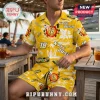 Man wearing yellow Kyle Busch NASCAR tropical button-down shirt and matching shorts with palm trees and race car graphics.!
