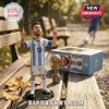Lionel Messi bobblehead in an Argentina jersey with World Cup trophy replica on a wooden bench.!