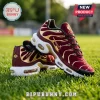 Maroon and gold Liverpool FC themed Nike Air Max sneakers on green grass with L.F.C. emblem and Champions text detailing.!