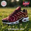 Maroon and gold Liverpool FC sneaker with white air-cushioned sole, grass background, and Premier League trophy graphic.!
