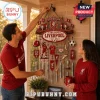 Liverpool FC decorative wall hanging with team emblems, player figurine, soccer ball, and metallic wind chimes on brick.!