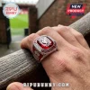 Liverpool FC championship style ring with a red gemstone, silver metal band, and the Liverbird crest logo.!