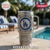 Los Angeles Dodgers engraved Yeti tumbler with blue rhinestones, stadium relief, and silver metal finish by a swimming pool.!