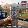 Los Angeles Dodgers stainless steel tumbler with engraved baseball motifs, blue accents, and Dodger Stadium relief design.!