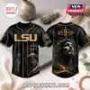 LSU Tigers Jesus Saved My Life baseball jersey with black and gold graphics, featuring a portrait of Jesus and crosses.