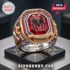 Marvel Spider-Man 64th Anniversary ring featuring a central red stone with a black spider logo and gold-tone detailing.