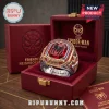 Marvel Spider-Man 64th Anniversary Ring featuring a central red stone, spider emblem, and metallic band in a display box.